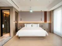 GEM Hotel (Xinyang Xi County Longhu Central City Wuyi Road) โรงแรมในซีเซียน
