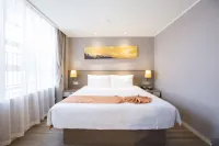 โรงแรมโฮมอินน์ พลัส (ห้างสรรพสินค้าวั่นด้า หยุนหลง ซูโจว) - ที่มีที่จอดรถ