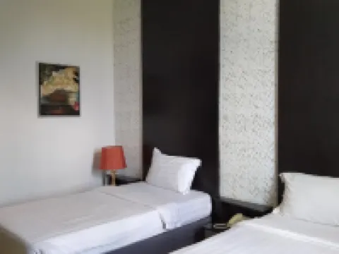 Ginasuite Kompleks27 Hotel โรงแรมในบันดาร์เซอรีเบอกาวัน