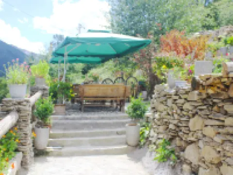 Four Sisters Mountain Knapsack International Hostel Hoteles en Xiaojin