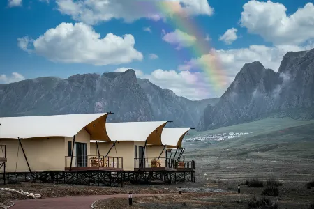 Ganjia Eco Campsite Отели рядом с достопримечательностью «White Rock Cliffs»