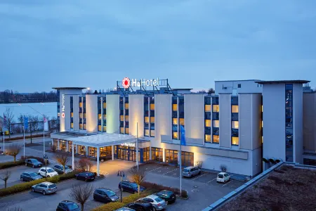 H4 Hotel Leipzig Отели в г. Тауха