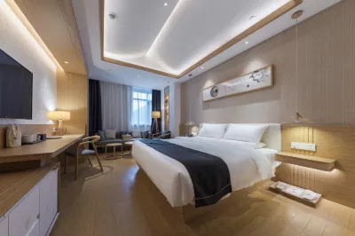 Shanhe Puyin Hotel (Xinyang East high speed railway station store)