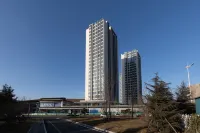 Tuyuan Seaview LOFT Holiday Apartment (Weihai Ferry Terminal Huafa Xintiandi Branch) Hotel di 