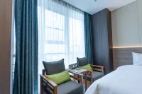 Zetao Hotel (Gulja Hanbin Park Branch) - Balkoner