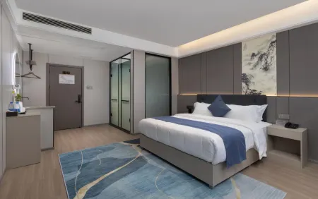 Manju Hotel (Gongqingcheng High speed Railway Station Store) Отели в г. Гунцинчен