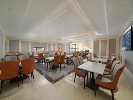 Vienna Hotel (Kunshan Huaxi Garden metro ) Отели рядом с достопримечательностью «TIANFU WETLANDS»