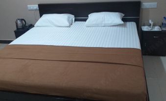 The Nisarga Grand Boarding & lodging