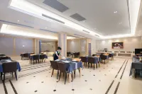 Vienna International Hotel (Shicheng Qinjiang Park) - breakfast