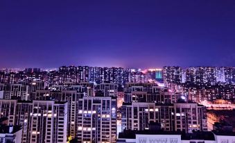 Xinju Sense Apartment (Qingdao Lanshan Bay)