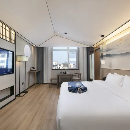 Moshang Qingju Hotel (Xinyang Huaibin West Asia Meiyue Plaza County Government Store)