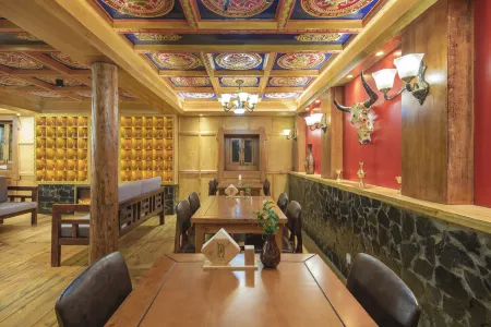 Yake Inn Отели в г. Кандин