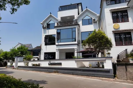 Jiuju Shendu Inn Отели рядом с достопримечательностью «China’s Kingdom of Root Carving»