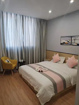 Luojiang Yijia Business Hotel