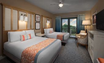 a hotel room with two beds , a chair , and a sliding glass door leading to a balcony at Disney's Vero Beach Resort