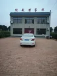 Jingbian Longwu Farmhouse Hotels near The Wave Valley Scenic Area