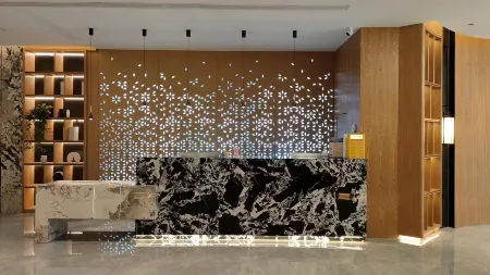 Hilton Hotel Отели в г. Хайлунь