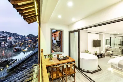 Xitang Muguang Qiyin Homestay Отели рядом с достопримечательностью «Парк Чжоу»