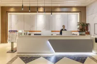 Xinning Jincheng Hotel (Langshan Avenue West Bus Station)