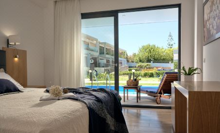 Cavo Orient Beach Hotel & Suites - Housity