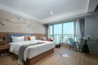 May Boutique Hotel (Xinyang East Railway Station Evergrande Plaza) - balcony