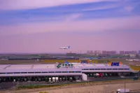 Licheng Hotel (Urumqi Diwobao International Airport Branch) - خدمة نقل من وإلى المطار