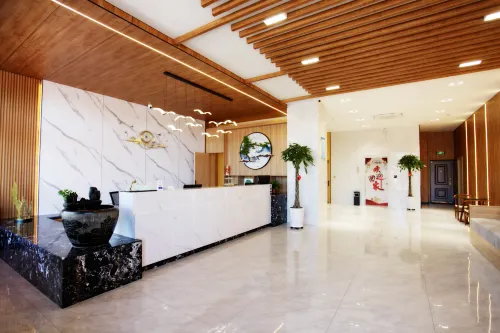 ORANGE HOTEL Hotels in Tailai