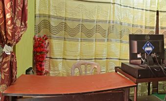 Capital O 90664 Rabi Hotel