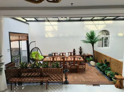 Caotang Garden Hotel Отели рядом с достопримечательностью «И Цин-Саунд»