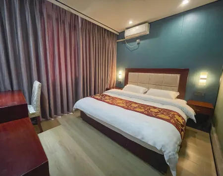 HuanMu Отели рядом с достопримечательностью «Tonglv Passenger Transport Terminal»