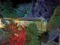 龍巖客天下温泉山莊 鄰近永定區金豐溪東洋溪安全生態水系建設項目部的酒店