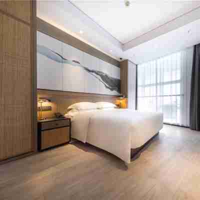 Jinyi youyou Hotel (Baotou Olympic Park store) Rooms