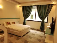 菲語農莊（西嶺雪山店） 鄰近西嶺雪山景區-千四百五十米碑的酒店