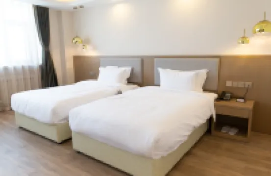 Harbin time coast hot springs business hotel Hotels in Hadong Wanda Plaza