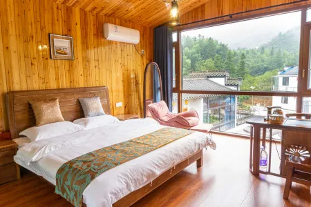 Kuanxinge  homestay Отели рядом с достопримечательностью «Fenghuangyuan»