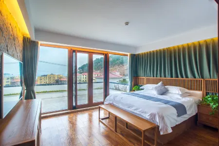 Qingdao Yushangshan·Tangchi Health Resort Hotel Отели рядом с достопримечательностью «Liuqing Bay»