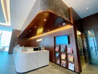 HomeinnsPlus Hotel（Shanghai Pudong International Airport East Station Branch) فنادق في شنغهاي