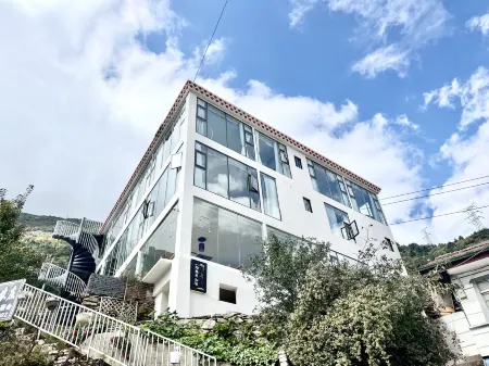 Shiyihao Shanju (Kangding Liuliucheng Branch) Отели рядом с достопримечательностью «Nanwusi»