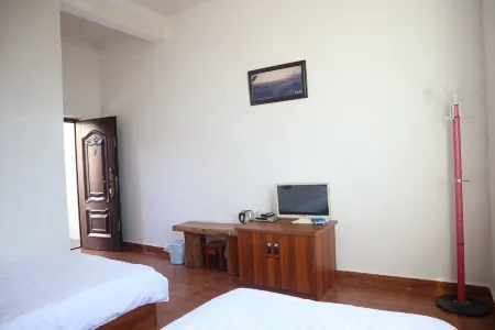 Xinping Lvli Piaoxiang Accommodation Отели рядом с достопримечательностью «Nan'en Waterfall»