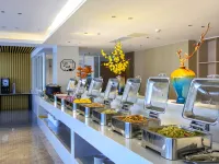 Huaxin Civil Aviation Hotel (Xinyang East High-speed Railway Station) - servizio colazione