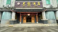 Shilin Heizuan Hotel