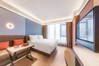 Orange Hotel (Xinghua RT-Mart Store Hotels near Qianduo (Raised Wetland Fields) Scenic Area