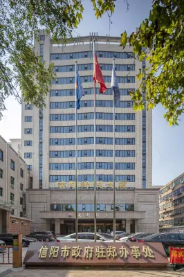 Dabie Mountain Hotel Отели в г. Коммерческий и финансовый центр