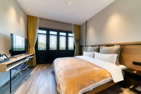 Muye Guesthouse Отели рядом с достопримечательностью «Shangougou Scenic Resort»