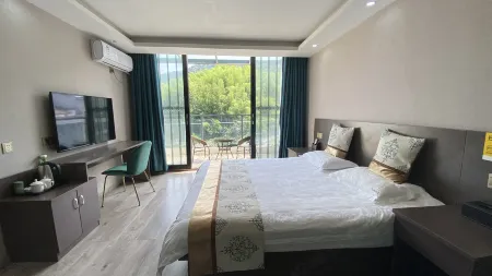 Wenya Farm B&B Отели рядом с достопримечательностью «Baima Canyon»