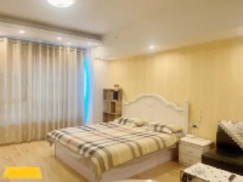 Mudanjiang Wanda Plaza Walnut Apartment