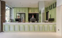 Elong ETANG Hotel (Zhoukou Chuanhui District Wuyi Wenhua Square) فنادق في جَوكَو