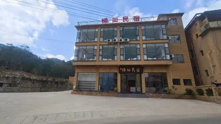 yuanyantitianminsu(duoyishutitianjingqudian) Отели рядом с достопримечательностью «Laohuzui Terraced Field»