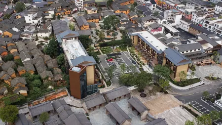 Dingnan County Blossoming in Order Bula Hotel Отели в г. Динань