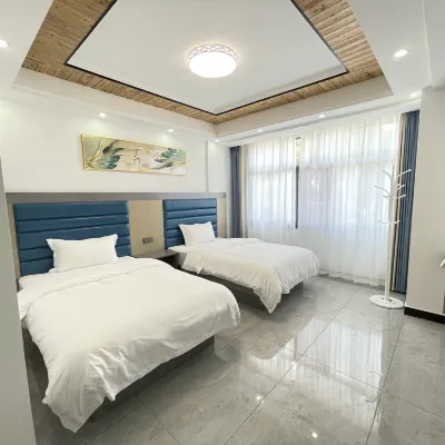 Xinyue Homestay Hoteles cerca de Qiliang Cave